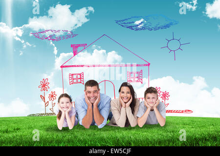 Image composite de happy family lying with head in hands Banque D'Images