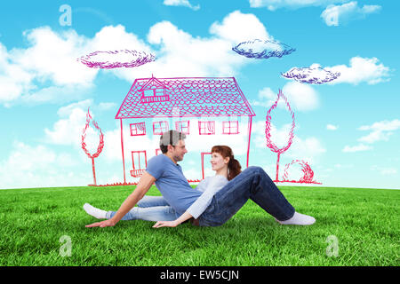 Image composite de couple assis sur le plancher Banque D'Images