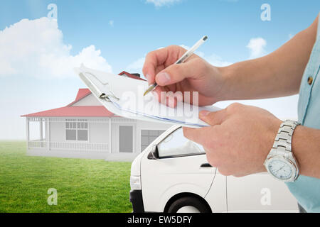 Image composite de delivery man writing on clipboard Banque D'Images