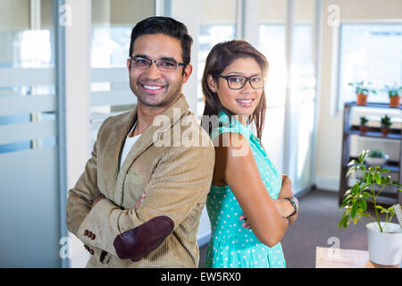 Portrait of smiling partners posing together Banque D'Images