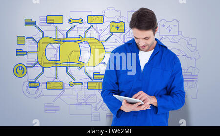 Image composite de mechanic using digital tablet over white background Banque D'Images