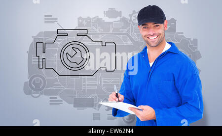 Image composite de handyman in blue dans l'ensemble writing on clipboard Banque D'Images