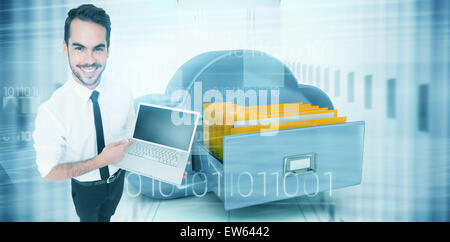 Portrait of businessman pointing his laptop Banque D'Images