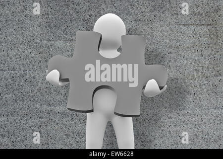 Image composite de personnage blanc holding jigsaw piece Banque D'Images