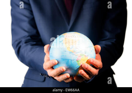 Part of businessman holding globe terrestre Banque D'Images