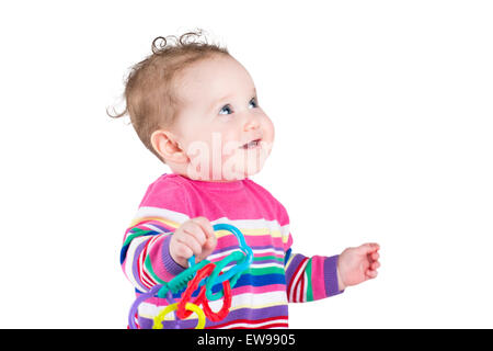 Portrait d'une drôle de petite fille en rose une robe rayée, isolated on white Banque D'Images