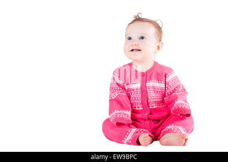 Sweet baby girl dans un chandail rose avec des coeurs, isolated on white Banque D'Images