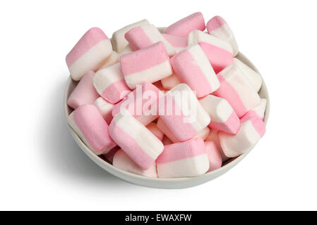 Les guimauves - sweet de confiseries dans un bol blanc. Isolé sur fond blanc Banque D'Images