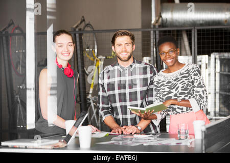 Portrait creative business people working in office Banque D'Images