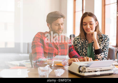 Creative business people working at typewriter Banque D'Images