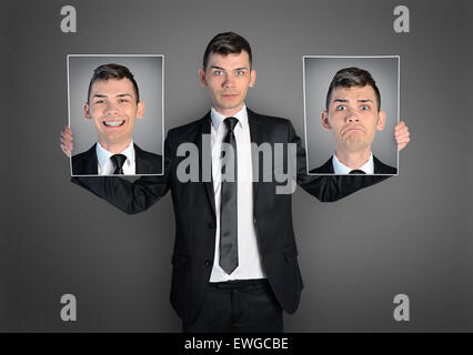L'homme d'affaires avec différents visages Banque D'Images