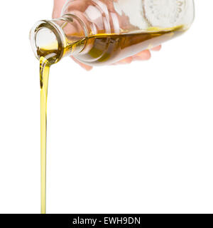 L'huile à partir d'une bouteille. Banque D'Images