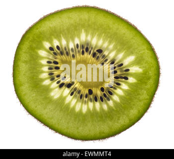 Les kiwis en tranches fines en translucide blanc retour Banque D'Images