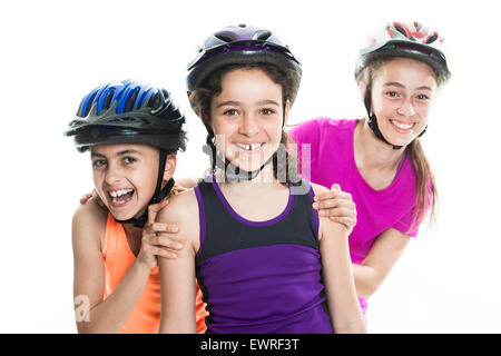 Portrait de jeune fille sur rollers skating isolé sur fond blanc Banque D'Images