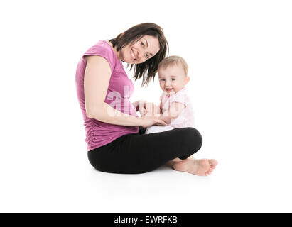 Studio Portrait de Mère avec jeune bébé fille Banque D'Images