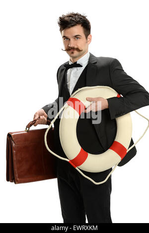 Portrait of young woman holding suitcase et life ring isolated over white background Banque D'Images