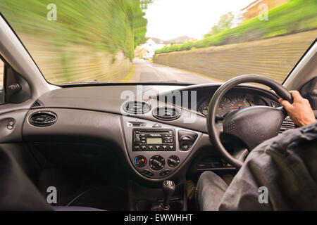 Motion Blur of rural road à partir de l'intérieur de voiture Banque D'Images