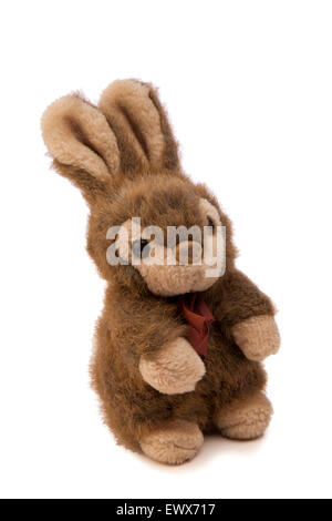 Les jouets, enfant de doudous peluche lapin avec ruban rouge autour du cou Banque D'Images