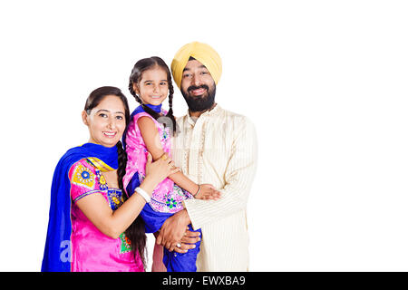 Les parents et la fille indienne Punjabi caring Banque D'Images