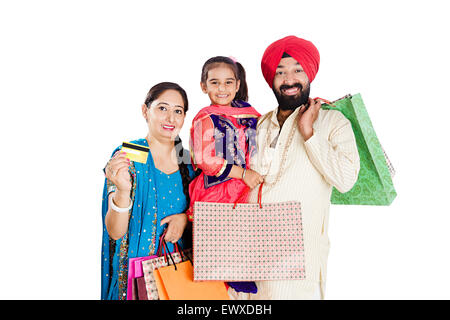 Les parents et la fille indienne Punjabi shopping carte de crédit Banque D'Images