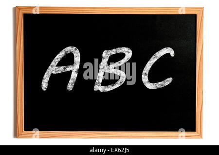 Chalk ABC Texte sur ardoise avec cadre en bois isolé sur blanc Banque D'Images