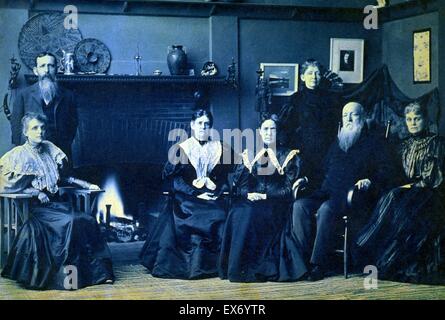 Frances Benjamin Johnston, 1864-1952, photographe. Posant avec six membres de sa famille, par cheminée, dans son studio 1896 Washington, D.C. Banque D'Images