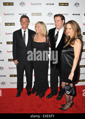 LOS ANGELES, CA - le 22 janvier 2011 : Olivia Newton-John & mari John Easterling (à gauche) avec John Travolta et Kelly Preston à l 2011 G'DAY USA Black Tie Gala au Hollywood Palladium. Banque D'Images