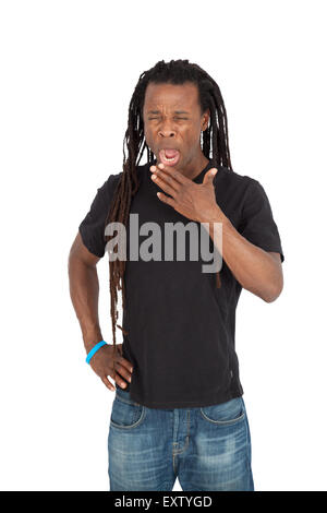 Bel homme avec des dreadlocks faisant différentes expressions dans différents ensembles de vêtements : yawning Banque D'Images