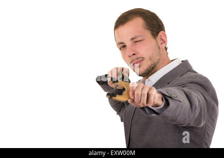 Hansome business man concentrées visant une fronde isolated over white background Banque D'Images