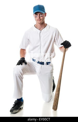 Joueur de baseball des jeunes adultes. Studio shot sur blanc. Banque D'Images