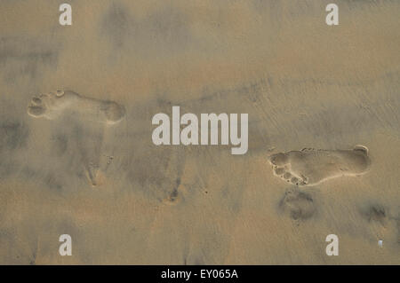 Footprints in sand Banque D'Images