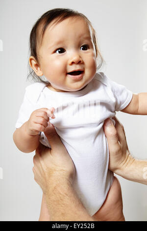 Portrait of baby girl, smiling Banque D'Images