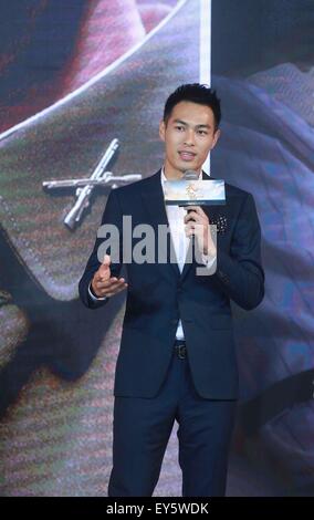 Beijing, Chine. 22 juillet, 2015. Acteur Tony Yeung assiste à une conférence de presse du film 'La Traversée Part 2" à Beijing, capitale de Chine, le 22 juillet 2015. Le film sera montré sur le 30 juillet. © Chen Jiannan/Xinhua/Alamy Live News Banque D'Images