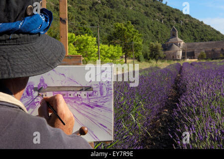 La peinture de l'artiste dans les champs de lavande à l'Abbaye Notre-dame de l'Abbaye de Senanque( Senaque ) , Gordes, Provence, France Banque D'Images