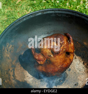 Tournedos de poulet mariné et farcis d'une canette de bière Banque D'Images