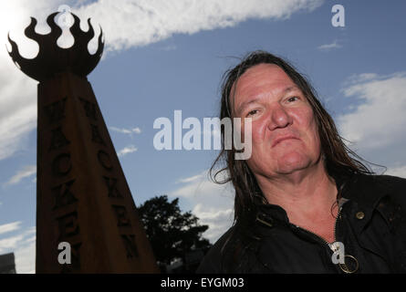 Le Wacken, Allemagne. 29 juillet, 2015. Thomas Jensen, fondateur et organisateur de l'W.O.A. (Wacken Open Air), pose sur le site du festival au Wacken, Allemagne, 29 juillet 2015. Heavy metal fans de partout dans le monde viennent à Wacken à célébrer le plus grand festival de heavy metal. Photo : AXEL HEIMKEN/dpa/Alamy Live News Banque D'Images