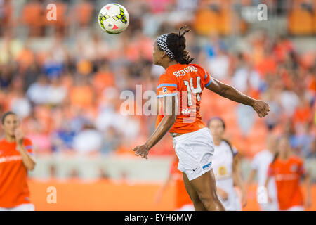 Houston, Texas, USA. 29 juillet, 2015. Houston Dash en avant Jessica McDonald (14) à la tête de la balle pendant le 1er semestre d'un jeu entre l'avancée NWSL Houston Dash et à Kansas City FC Stade BBVA Compass à Houston, TX, le 29 juillet 2015. Credit : Trask Smith/ZUMA/Alamy Fil Live News Banque D'Images