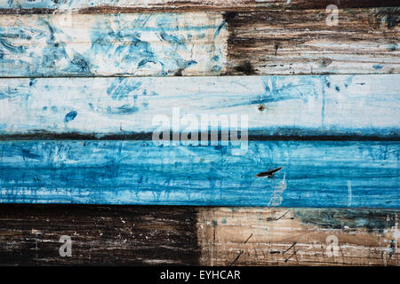 Vieux fond métal peint ressemble à bois - bleu, blanc, marron et jaune Banque D'Images