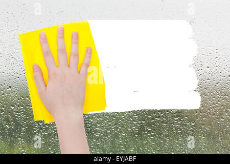 Concept météo - supprime les gouttes sur le verre par rag à partir de l'image jaune et blanc copie espace vide apparaissent Banque D'Images
