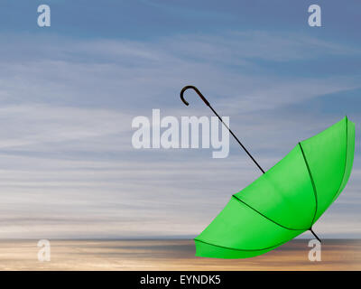 La Solitude, mauvais temps concept. Parapluie de plage déserte. Banque D'Images