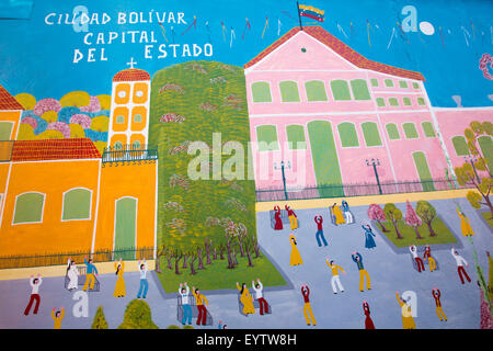 Le graffiti peint sur mur dans la ville coloniale de Ciudad Bolivar. L'illustration représente les gens danser sur la principale place publique. Banque D'Images
