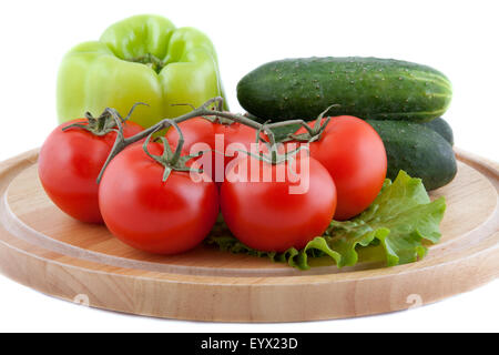 Légumes frais on a chopping board Banque D'Images