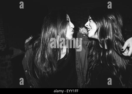 Smiling women laughing at party Banque D'Images