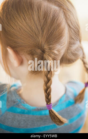 Close up of red hair of Caucasian girl en amorces Banque D'Images