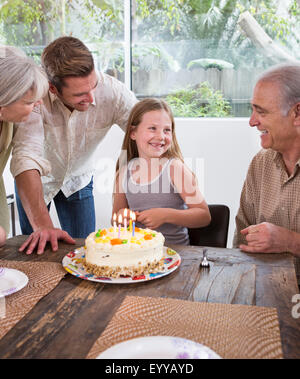 Caucasian family celebrating birthday at table Banque D'Images