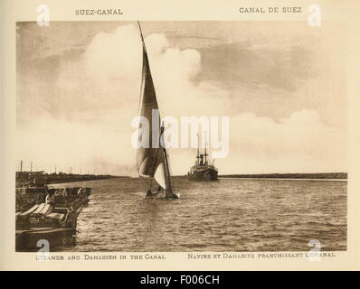 Canal de Suez, Egypte - 1900 - Un voilier (Dehabeah) et un bateau à vapeur dans le canal de Suez. Banque D'Images