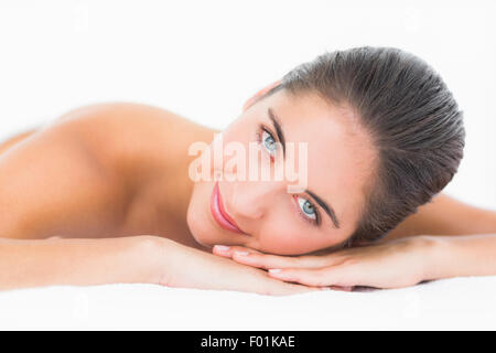 Close up portrait of a beautiful young woman on massage table Banque D'Images