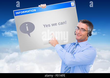 Image composite de main d'un businessman holding a le câble blanc Banque D'Images