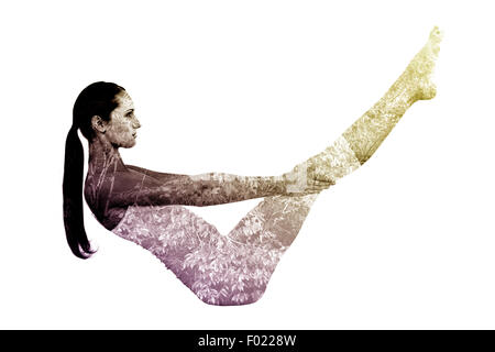 Image composite de tonique femme voile posent in fitness studio Banque D'Images