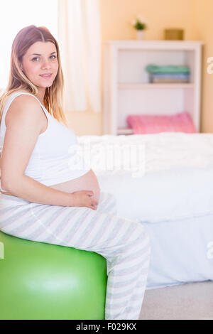 Femme enceinte garder la forme Banque D'Images